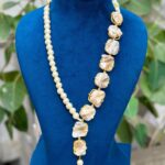 Asymmetric baroque pearl necklace featuring natural irregular pearls with elegant gold-finish setting