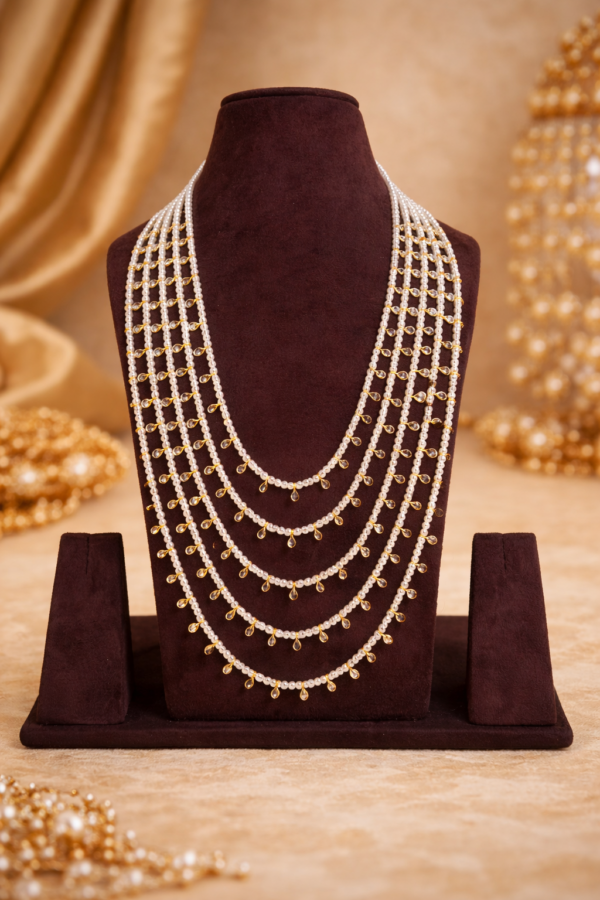 Traditional five-layer white pearl rani haram necklace with elegant drop detailing
