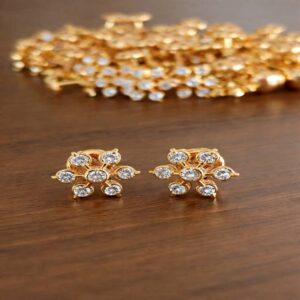 Panchaloham gold finish floral CZ stud earrings for festive wear
